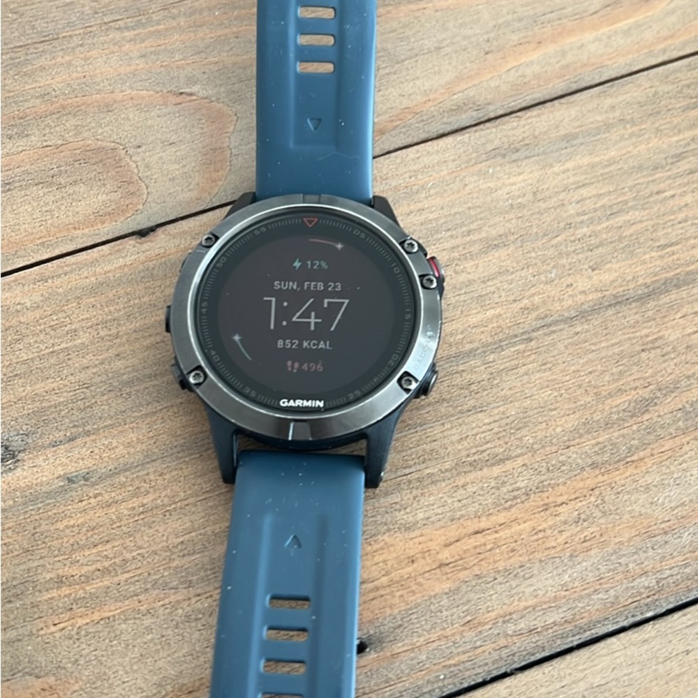 Garmin Blue Smartwatch with Circular Display and Silicone Strap